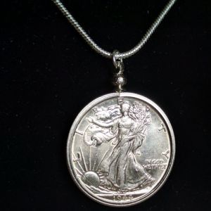 Walking Liberty Half Dollar coin necklace showing the obverse of the genuine silver coin