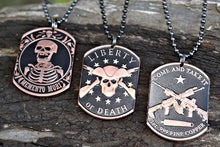 Set of three copper dog tag necklaces featuring Liberty or Death, Memento Mori, and Molon Labe