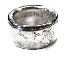 Side view of polished American Silver Eagle coin ring showing the handcrafted band