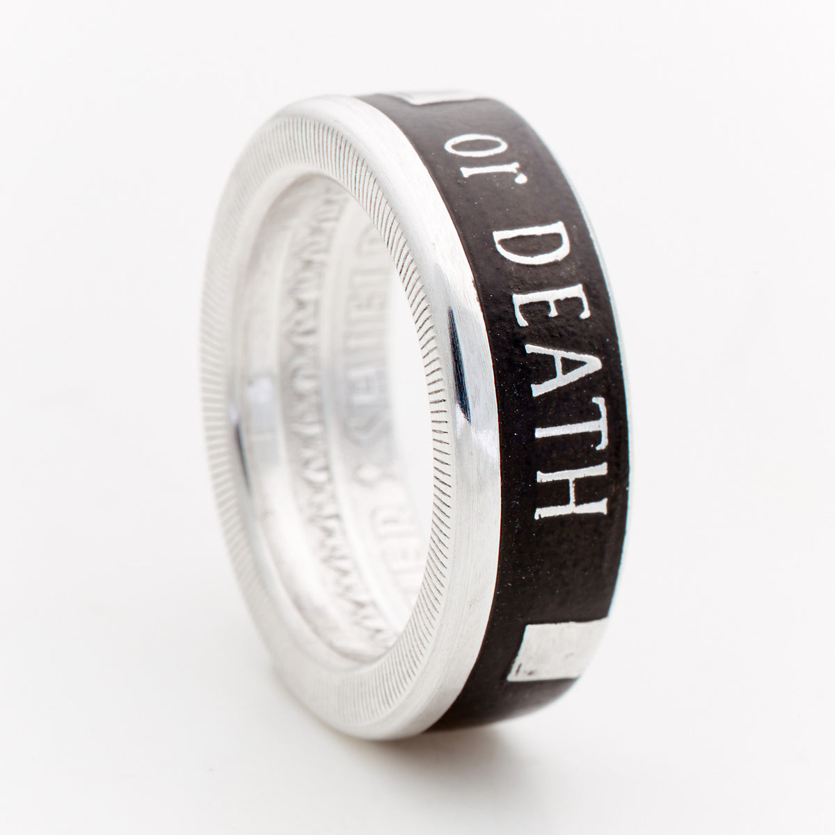 Opposite side of Liberty or Death silver coin ring showing DEATH lettering