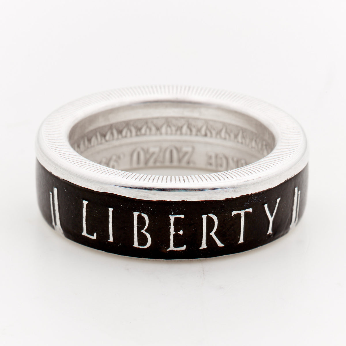 Side view of Liberty or Death silver coin ring showing LIBERTY lettering
