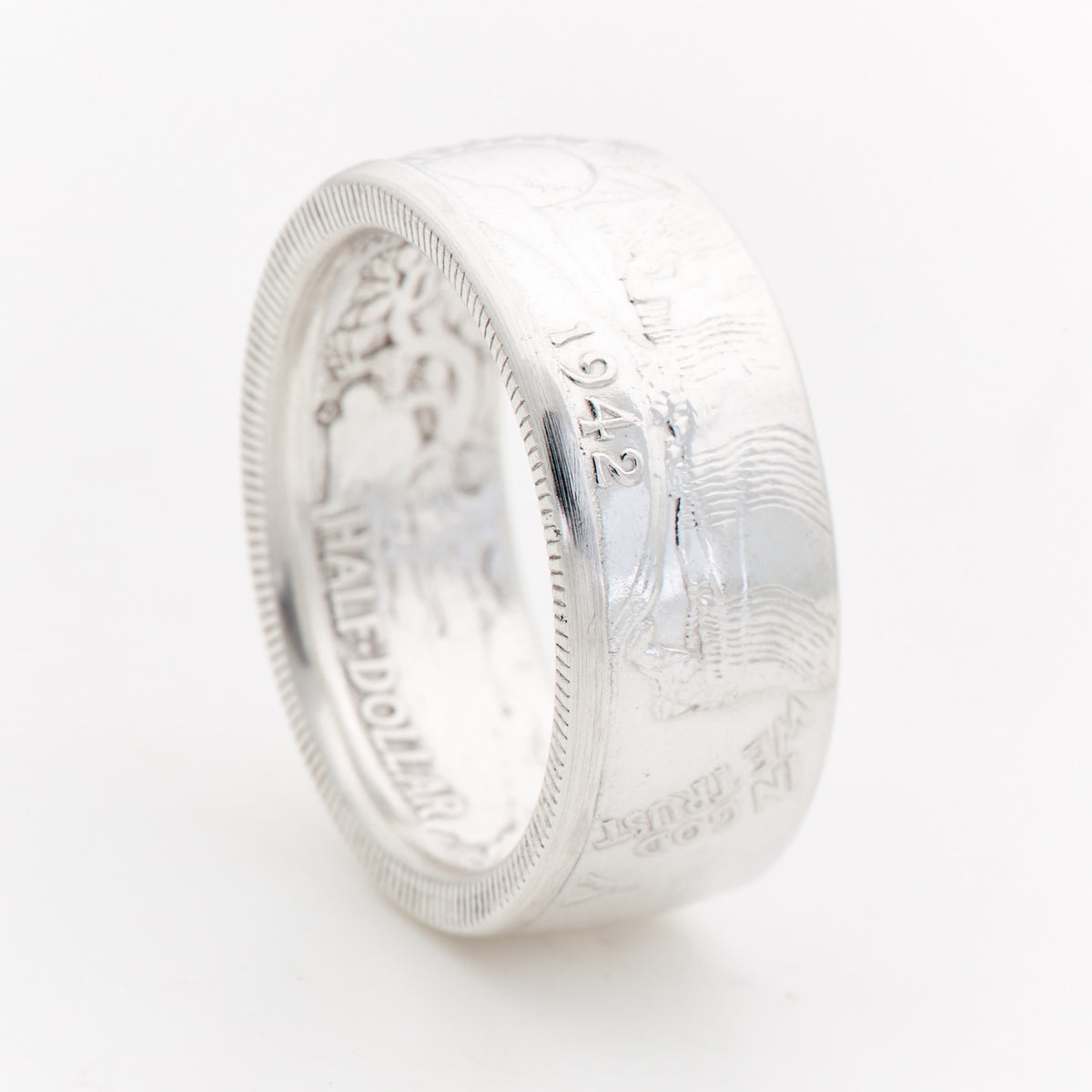 Polished Walking Liberty Half Dollar coin ring showing the interior coin lettering