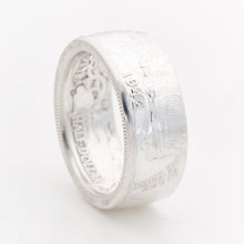 Polished Walking Liberty Half Dollar coin ring showing the interior coin lettering