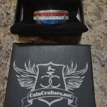 Customer wearing a two-tone CoinCrafters coin ring outdoors